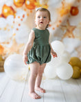 Load image into Gallery viewer, mace and co kids clothing dubai, romper with long bow back in linen material and khaki green colour. Girls ages up to seven years old, including infant and toddler. Perfect for playtime, birthday parties and formal events.