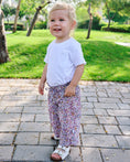 Load image into Gallery viewer, Mace and co kids Dubai Cotton floral pants for girls, front view. Perfect for playdates, parties and casual wear
