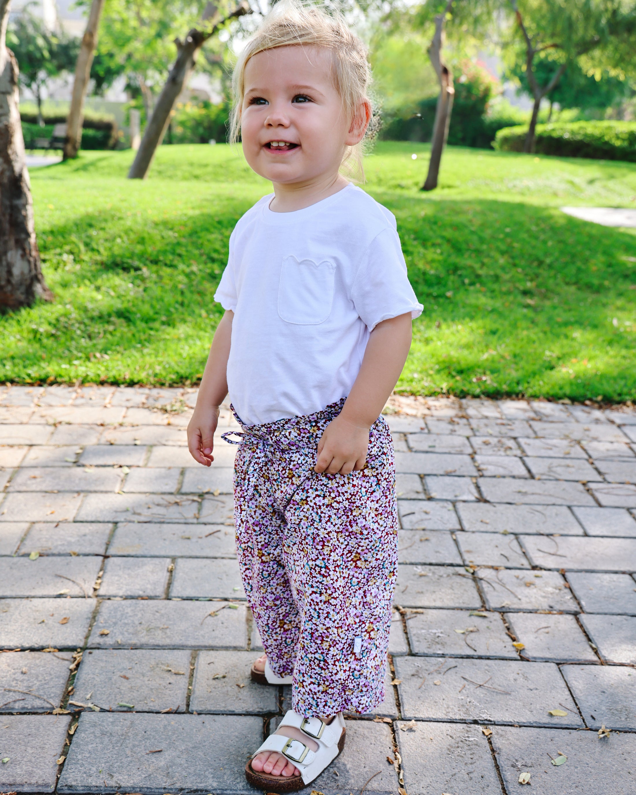 Mace and co kids Dubai Cotton floral pants for girls, front view. Perfect for playdates, parties and casual wear