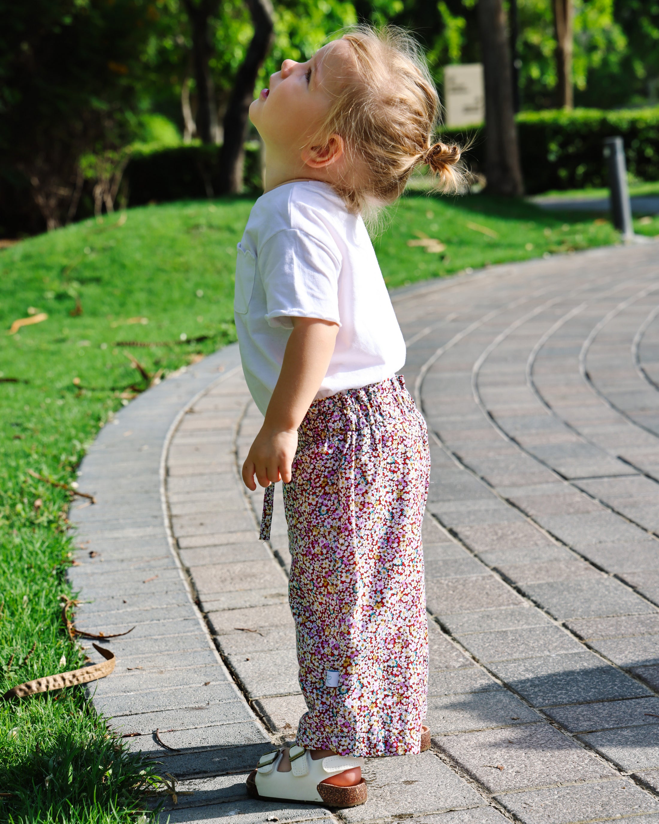 Mace and co kids Dubai Cotton floral pants for girls, side view. Perfect for playdates, parties and casual wear