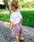 Load image into Gallery viewer, Mace and co kids Dubai Cotton floral shorts for girls, side view. Perfect for playdates, parties and casual wear
