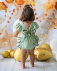 Load image into Gallery viewer, mace and co kids clothing dubai, romper with bow back in mint green colour, linen fabric material, for girls ages infant, toddler up to seven years old, perfect for birthday parties, special occasions and formal wear.
