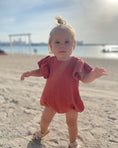 Load image into Gallery viewer, mace and co kids dubai muslin material ruffle sleeve romper in rustic brown colour, for girls, perfect for casual wear, beach trips, parties and playtime.
